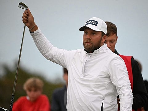 England's Daniel Brown selects his club on the 17th tee on the opening day of the 152nd British Open Golf Championship at Royal Troon on Thursday.