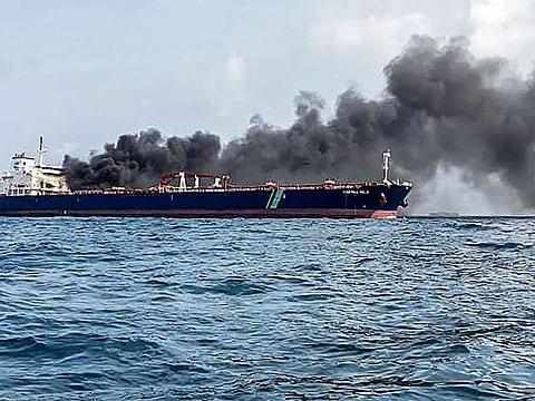 Singaporean authorities said two oil tankers caught fire off its coast and two crew members were airlifted to a hospital
