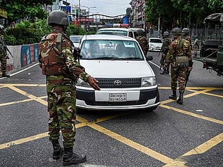 Twelve killed in twin Bangladesh jailbreaks
