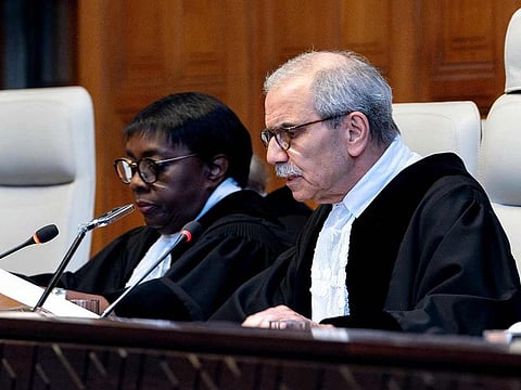 Judge and President of the International Court of Justice (ICJ), Nawaf Salam (right) delivers a non-binding ruling on the legal consequences of the Israeli occupation of the West Bank and East Jerusalem at the International Court of Justice (ICJ) in The Hague on July 19, 2024. 