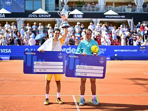 Portugal's Nuno Borges (left) and Spain's Rafael Nadal celebrate after their men's final singles match of the ATP Nordea Open tennis tournament in Bastad, Sweden, on Sunday.