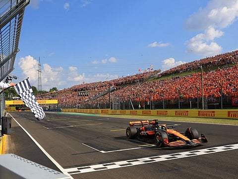 McLaren's Australian driver Oscar Piastri takes the chequered flag of the Formula One Hungarian Grand Prix at the Hungaroring race track in Mogyorod near Budapest on Sunday.