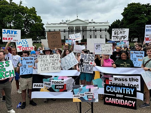 Protesters demand US President Joe Biden "Pass the Torch," in front of of the White House in Washington, DC, on July, 20, 2024.  