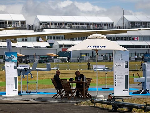 Attendees at the Airbus SE Unmanned Air Systems (UAS) static display during the opening day of the Farnborough International Airshow in Farnborough, UK, on Monday, July 22, 2024. The aviation summit is typically a platform for planemakers to rack up multibillion-dollar deals.