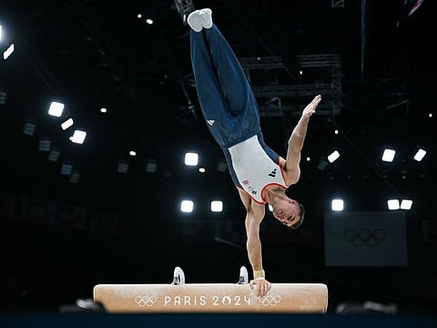 Britain's Max Whitlock practices on the pommel horse at the Bercy Arena, in Paris, on Wednesday, ahead of the start of the Paris 2024 Olympic Games.