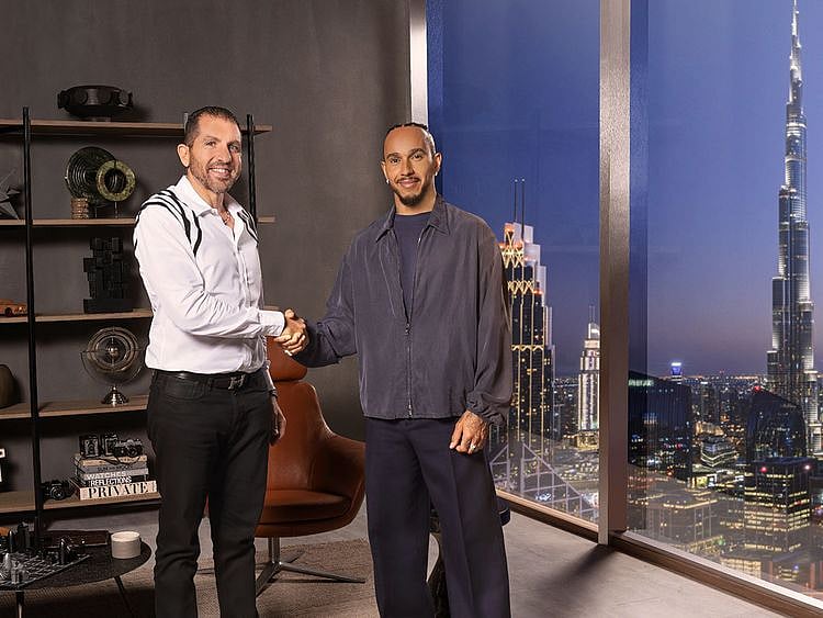  Hisham Mansour (left), Co-founder and Managing Director of CFI with Formula 1 World Champion Lewis Hamilton 