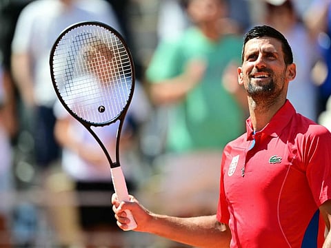 Serbia's Novak Djokovic reacts to his win over Spain's Rafael Nadal in their men's singles second round tennis match on Court Philippe-Chatrier at the Roland-Garros Stadium at the Paris 2024 Olympic Games, in Paris on Monday.
