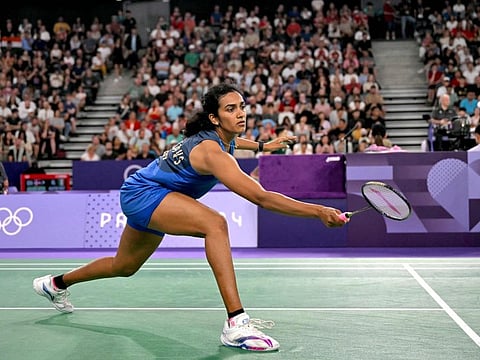 India's PV Sindhu in action against Estonia's Kristin Kuuba in their women's singles badminton group stage match during the Paris 2024 Olympic Games at Porte de la Chapelle Arena in Paris on Wednesday.