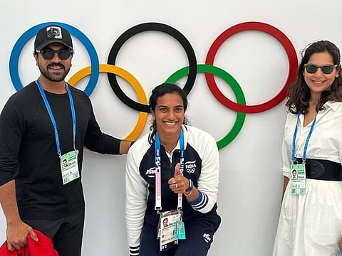 Ram Charan and Upasana with badminton player P V Sindhu