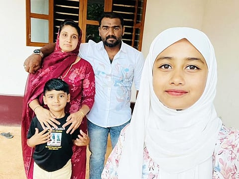 Dubai-based Indian expat Shajahan Kuttiyath with his family. They lost dozens of loved ones in the tragedy.