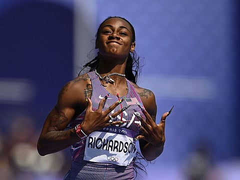 American Sha'Carri Richardson celebrates after winning the women's 100-metre heat in the Paris Olympic Games.