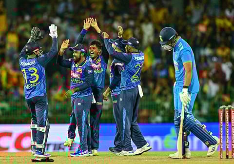 Sri Lanka's Jeffrey Vandersay celebrates with teammates after taking the wicket of India's Shivam Dube during the second ODI cricket match at the R. Premadasa International Cricket Stadium in Colombo on Sunday.