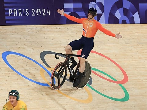 Netherlands' Harrie Lavreysen celebrates winning the men's track cycling keirin final for gold of the Paris 2024 Olympic Games at the Saint-Quentin-en-Yvelines National Velodrome in Montigny-le-Bretonneux, south-west of Paris, on Sunday.