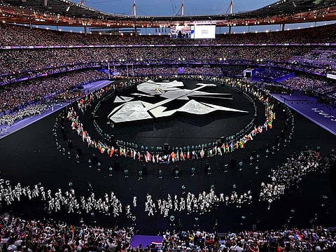 Athletes enter the stadium during the closing ceremony of the Paris 2024 Olympic Games at the Stade de France, in Saint-Denis, in the outskirts of Paris, on August 11, 2024. 