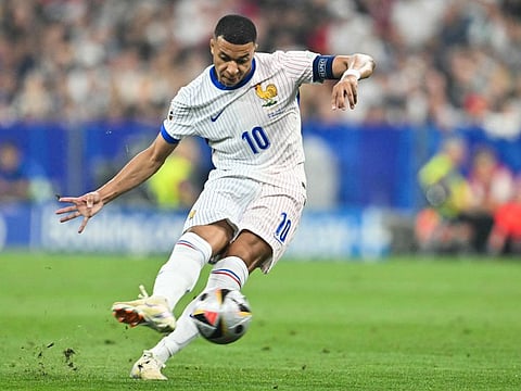 France's forward Kylian Mbappe attempts a shot during the Uefa Euro 2024 semi-final football match against Spain at the Munich Football Arena in Munich on July 9.