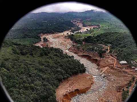Prime Minister Narendra Modi (unseen) conducts an aerial survey of the landslide-affected areas, in Wayanad on Saturday, August 10, 2024. 