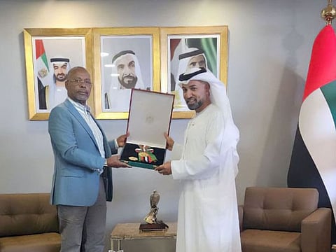  Dr. Salem Al Naqbi presented the medal to Kariuki Mugwe during a meeting held at the UAE Embassy in Nairobi.