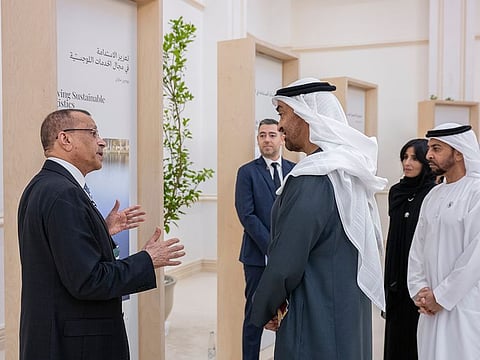 President His Highness Shaikh Mohammad Bin Zayed Al Nahyan listens as Tristar Group CEO, Eugene Mayne explains about the company’s first ever hybrid bunker barge, set to be positioned at the Port of Fujairah in early 2025