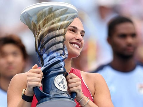 Aryna Sabalenka of Belaerus poses with the trophy after defeating Jessica Pegula of the United States during the women's final of the Cincinnati Open at the Lindner Family Tennis Center on Monday.