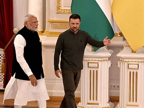Ukrainian President Volodymyr Zelensky (R) invites Indian Prime Minister Narendra Modi for talks in Mariinskyi Palace, on August 23, 2024. 