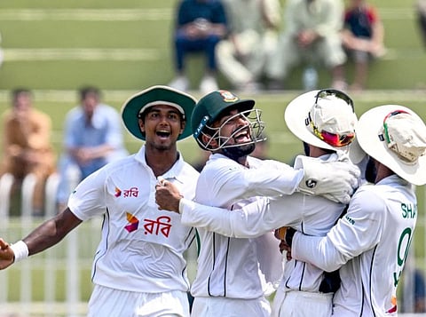 Bangladesh's players celebrate after the dismissal of Pakistan's Agha Salman during the fifth and final day of the first Test cricket match at the Rawalpindi Cricket Stadium in Rawalpindi on Sunday.