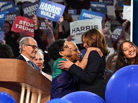 Kamala Harris greets relatives on the fourth and last day of the Democratic National Convention at the United Center in Chicago, Illinois, on August 22, 2024.  