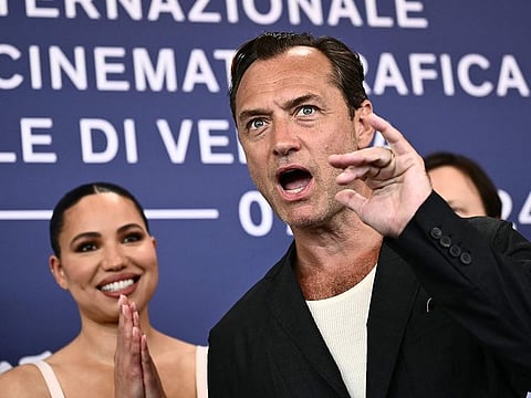 Actor Jude Law and actress Jurnee Smollett attend the photocall of the movie "The Order" presented in competition during the 81st International Venice Film Festival at Venice Lido, on August 31, 2024. 