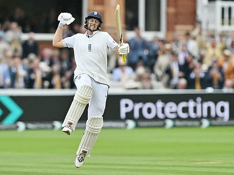 England's Joe Root celebrates after reaching his hundred on day three of the second Test against Sri Lanka at Lord's cricket ground in London on August 31, 2024. 