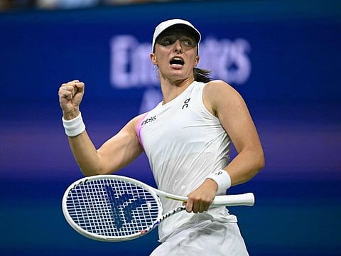 Poland's Iga Swiatek celebrates her victory over Russia's Anastasia Pavlyuchenkova during their women's singles third round match on day six of the US Open tennis tournament at the USTA Billie Jean King National Tennis Center in New York City, on August 31.