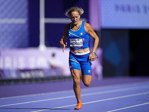 Italy's Valentina Petrillo competes in the womens 400m T12 athletic event during the Paris 2024 Paralympic Games at the Stade de France in Saint-Denis, north of Paris, on Monday.