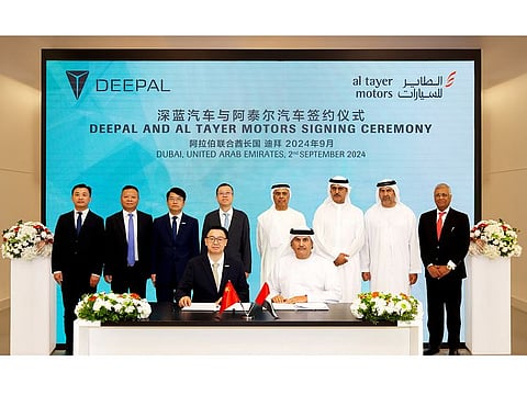 Seated: Saeed Humaid Al Tayer, Managing Director, Al Tayer Motors and Xiao Feng, General Manager, Changan Middle East & Africa Business Unit, sign the agreement in Dubai. Standing: Wang Jun, President of Changan Automobile; Li Mingcai, Executive Vice President of Changan Automobile; Li Peng, General Manager, Quality Department; and Yin Tong, Vice General Manager, Changan Middle East & Africa Business Unit along with Obaid Humaid Al Tayer, Chairman, Al Tayer Group; Matar Humaid Al Tayer, Board Member; Dr Tariq Humaid Al Tayer, Board Member; and Ashok Khanna, CEO, Al Tayer Motors at the signing ceremony.