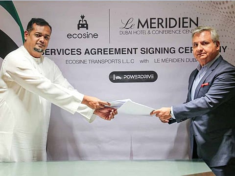 Salman Omar, Managing Director of Ecosine Transports LLC, and Fadeel Wehbe, General Manager of Le Meridien Dubai Hotel & Conference Centre.