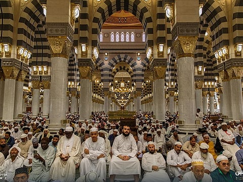 Worshippers gather for congregation prayers in the Prophet's Mosque in Medina.  