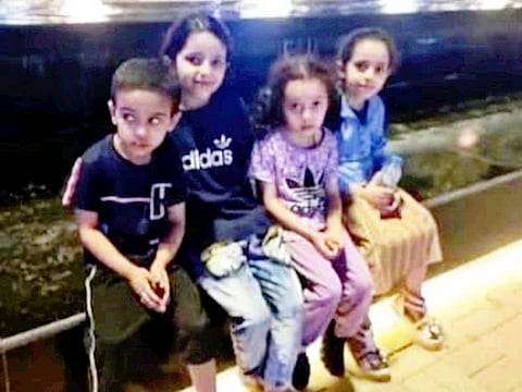 The four siblings seen in an undated photo.