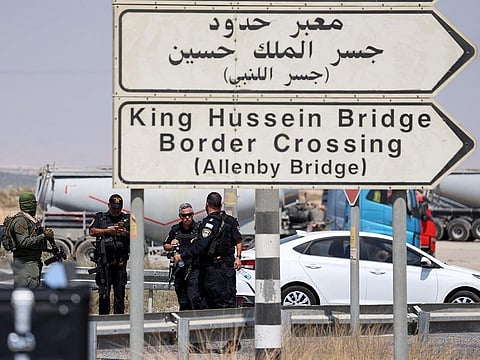 Israeli security forces gather at the scene of a reported attack near the Allenby Crossing between the occupied West Bank and Jordan on September 8, 2024, where the Israeli military said a truck driver opened fire, killing three Israelis. 