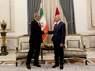 Iran president visits Iraq on first foreign trip