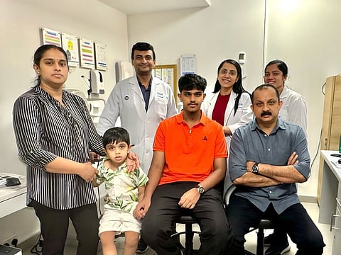 Dhikshit Kottiyattil Anoop, (2nd from R) with his parents and team of doctors after recovery at Aster Hospital Mankhool, Dubai