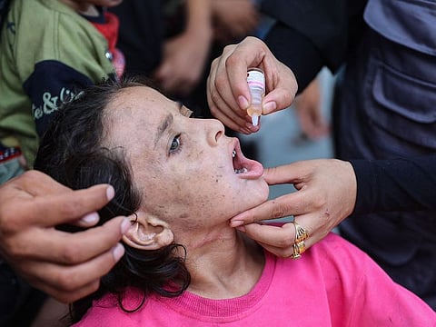 Palestinian medics administer polio vaccines to children at the Al Daraj neighbourhood clinic in Gaza City on September 10, 2024, amid the ongoing war between Israel and the Palestinian Hamas movement. 