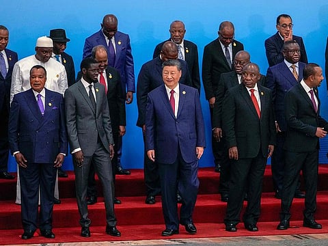 China's President Xi Jinping (C) stands with leaders from African countries as they gather for a group photo session before the opening ceremony of the Forum on China-Africa Cooperation (FOCAC) at the Great Hall of the People in Beijing on September 5, 2024. 