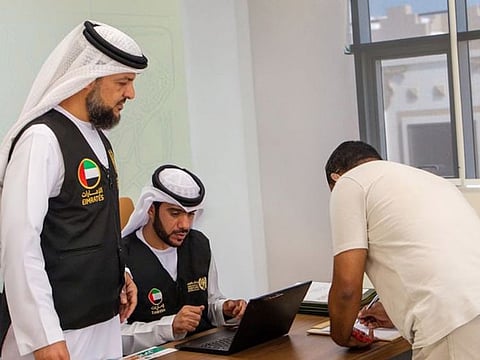 An amnesty seeker being guided about the procedures 