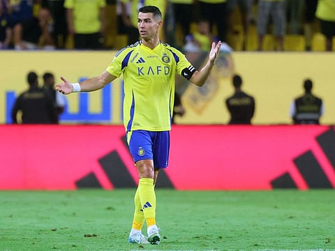 Al Nassr's Portuguese forward Cristiano Ronaldo gestures on the pitch during the Saudi Pro League football match against Al Ahli at Al Awwal Stadium in Riyadh on September 13.