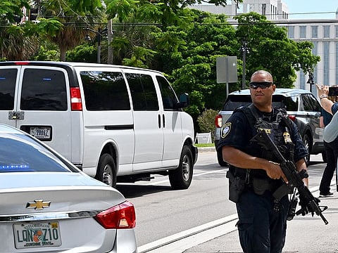 A van believed to be carrying Ryan Wesley Routh, the suspect in an apparent assasination attempt on former US President Donald Trump, leaves the Paul G. Rogers Federal Building and US Courthouse on September 16, 2024 in West Palm Beach, Florida.