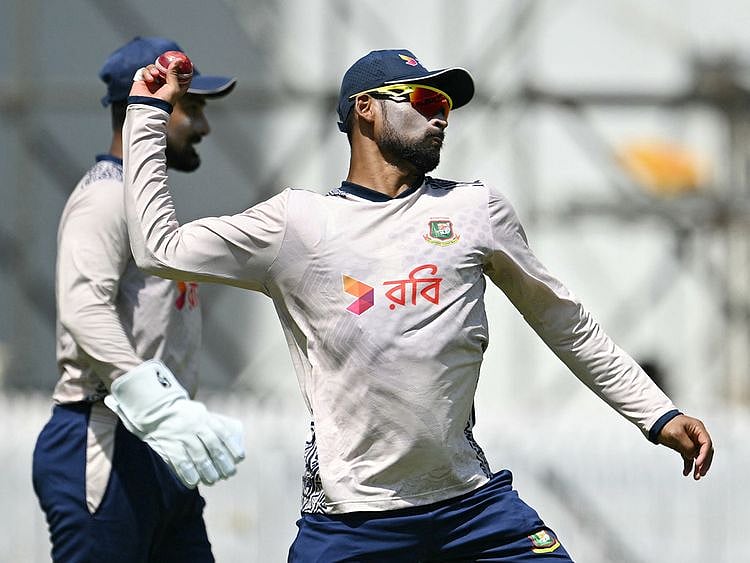 Bangladesh's captain Najmul Hossain Shanto (R) and Litton Das t
