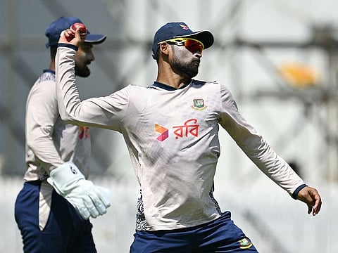 Bangladesh's captain Najmul Hossain Shanto (R) and Litton Das take part in a practice session at the M.A. Chidambaram Stadium in Chennai on September 17, 2024, ahead of their first cricket Test match against India. 