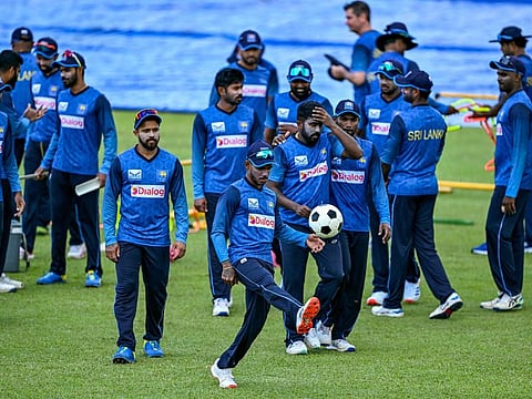 Sri Lankan players attend a practice session on the eve of their first Test cricket match against New Zealand at the Galle International Cricket Stadium in Galle on Tuesday.