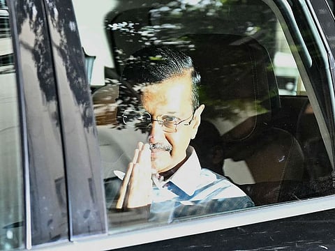 Aam Aadmi Party (AAP) leader and former chief minister of Delhi Arvind Kejriwal, gestures as he leaves the Lieutenant Governor of Delhi's office in New Delhi 