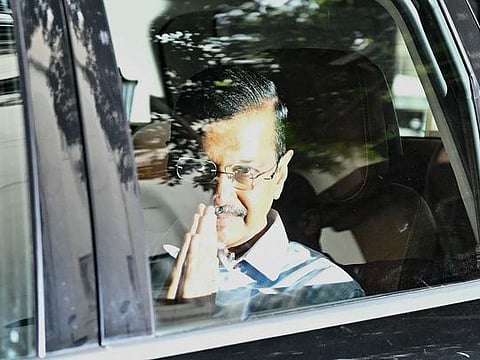 Aam Aadmi Party (AAP) leader and former chief minister of Delhi Arvind Kejriwal, gestures as he leaves the Lieutenant Governor of Delhi's office in New Delhi 