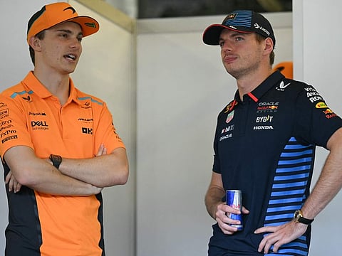 McLaren's Australian driver Oscar Piastri and Red Bull Racing's Dutch driver Max Verstappen attend the drivers' presentation prior to the Formula One Azerbaijan Grand Prix at the Baku City Circuit in Baku on September 15.