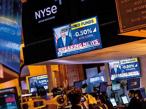 File photo: A television station broadcasts the Federal Reserve’s interest-rate cut on the floor of the New York Stock Exchange (NYSE) in New York, US, on Wednesday.