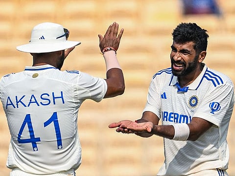 India's Jasprit Bumrah (right) celebrates with Akash Deep after taking the wicket of Bangladesh's Taskin Ahmed during the second day.
